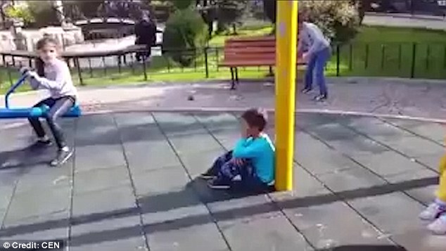 Shocking video shows Turkish men mocking Syrian boy in a playground and telling him a bomber is about to launch an airstrike right above him