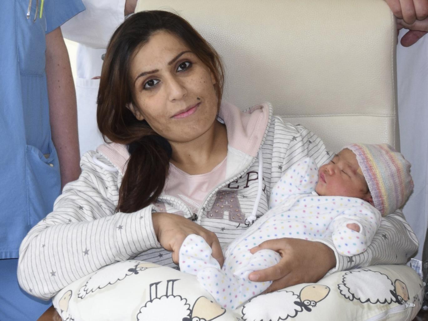 Syrian refugee family who found safety in Germany name their baby Angela Merkel