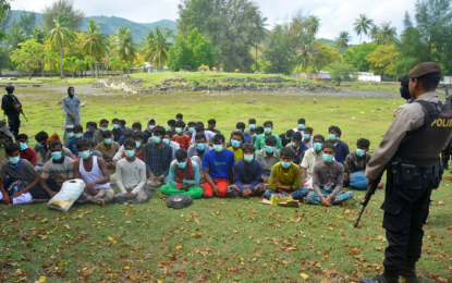 Dozens of Rohingya land in Indonesia after a month adrift at sea